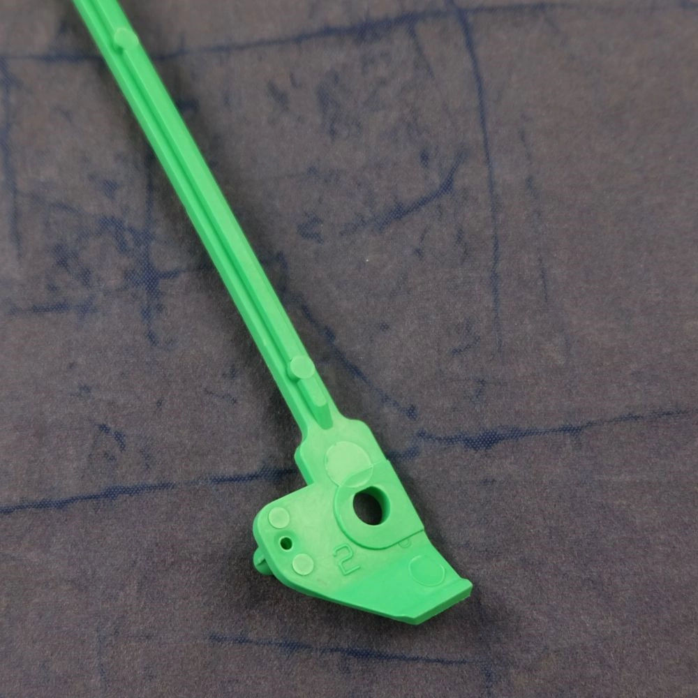 Közdarab, ajtó nyitó (eredeti) WHIRLPOOL / INDESIT mosógép / RENDELÉSRE